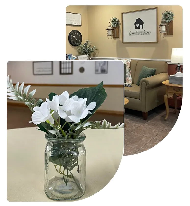 senior-care-conversation-windsor-house Nurse warmly talking to an elderly woman at Windsor House senior care community.